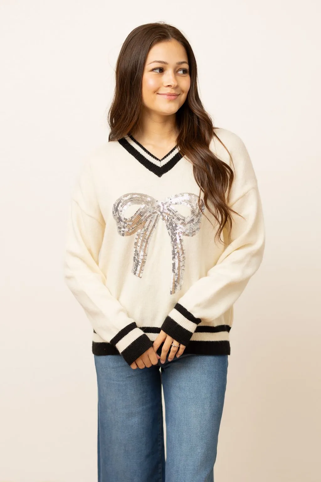 Silver Sequin Bow on Cream Varsity Sweater